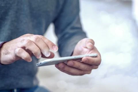 Man using smartphone Stock Photos