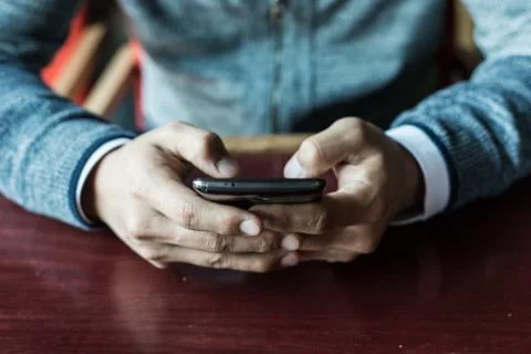 Man using a smartphone Stock Photos
