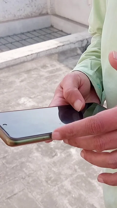 Man Using Smartphone on Rooftop in City, Mobile Technology Lifestyle Stock-Footage 328407672