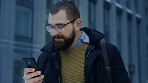 Man using smartphone scrolling Stock Footage 71982531