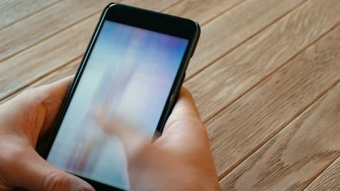 Man using smartphone scrolling through social media, doing swiping, scrolling Stock-Footage 120674552