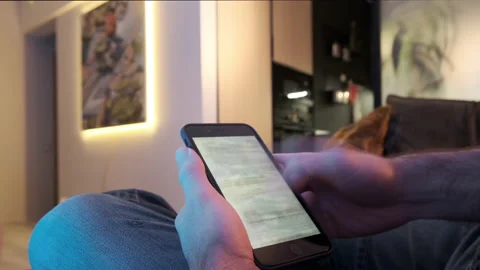 Man using smartphone scrolling through social media, doing swiping, scrolling 動画素材 151794895