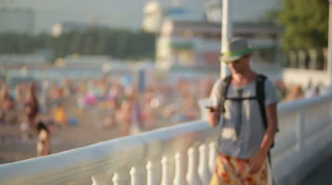 Man using smartphone by the sea. photographed on a phone Stock Footage 65428638
