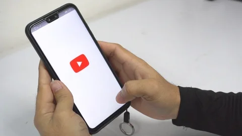 Man Using A Smartphone To Search Video On Youtube Stock Footage 106791770