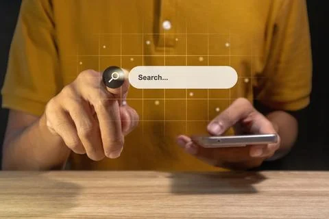Man using a smartphone to searching for information. Search engine optimiza.. Stock Photos