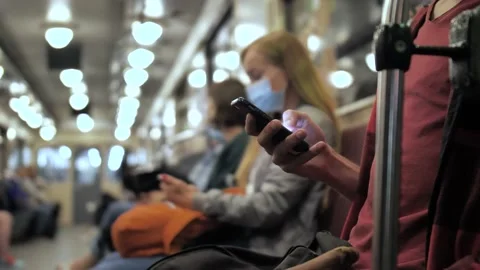 Man using smartphone sitting in underground metro Stock Footage 139072408