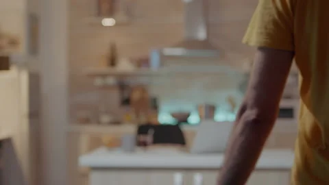 Man using smartphone with smart home security app turning on the lights Stock Footage 152881624