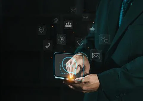 Man using smartphone with speech bubble and emoticon icon concept for techn.. Stockfoto's