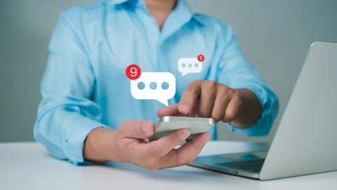 Man using smartphone typing live chat chatting on application communication.. Stock Photos