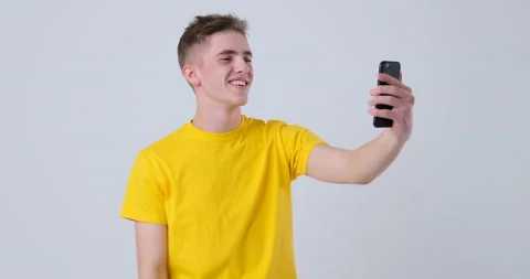 Man using smartphone to video call Stock Footage 144958123