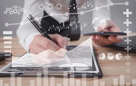 Man using smartphone. Working with a business graphs. Growth. Business. Succe Stock Photos