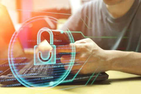 Man using smartphone at working desk double exposure with blue light padlock Stock Photos