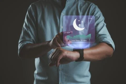 Man using smartwatch with sleep tracking hologram interface. Digital sleep .. Stock Photos