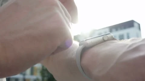Man using smartwatch touchscreen wearable technology device. Closeup Stock Footage 94061771