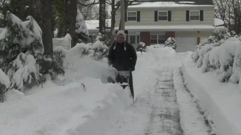 Man Using Snow Blower in Deep Snow 2 Stock Footage 586962