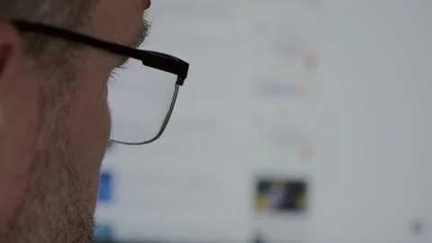 A man using on social networks reads the blur news feed page online. Video stock 184052510