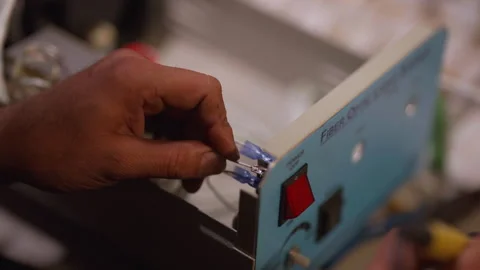 Man using a soldering machine in a factory Stock Footage 289279425