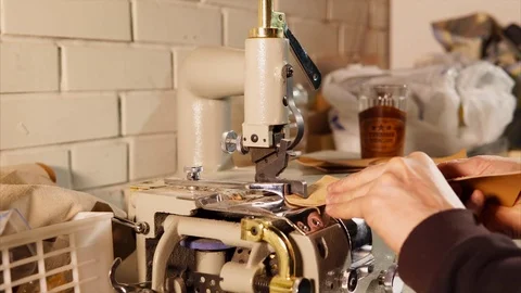 Man is using special machine to cut leather. Stock Footage 83047414