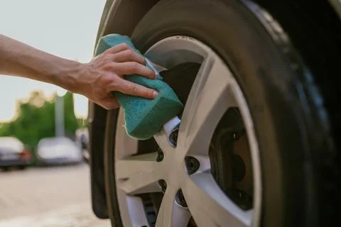 Man using sponge, hand car wash Foto stock