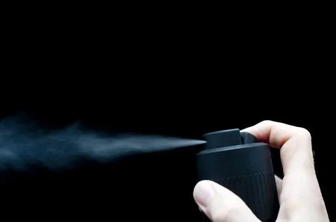 Man using a spray can Stock Photos