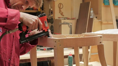 Man Using a Staple Gun, Medium Shot Stock Footage 40336937