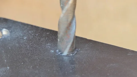 Man using a steel drill for drill metal. Video stock 89413624