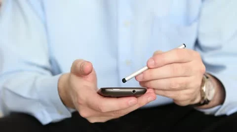 Man using stylus pen for smartphone Stock Footage 22008848
