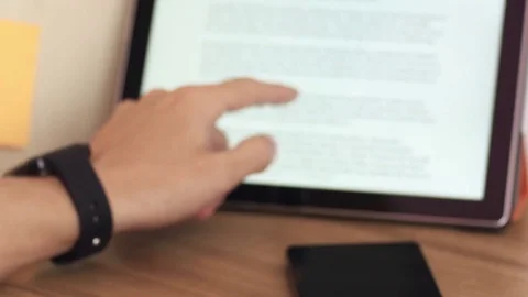 Man using tablet and smartwatch at work Stock Footage 70210525
