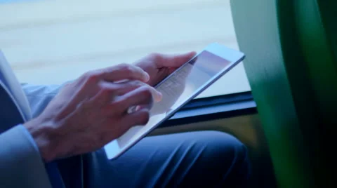 Man using the tablet on the bus Stock Footage 67105438
