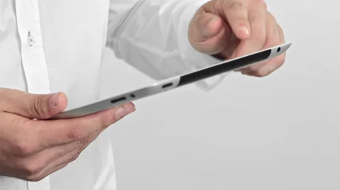 Man using a tablet computer, isolated over a white background Stock Footage 51841302