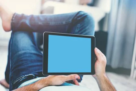 Man using tablet computer Photos