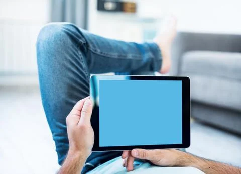 Man using tablet computer Fotos de archivo