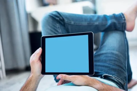 Man using tablet computer Fotos de archivo