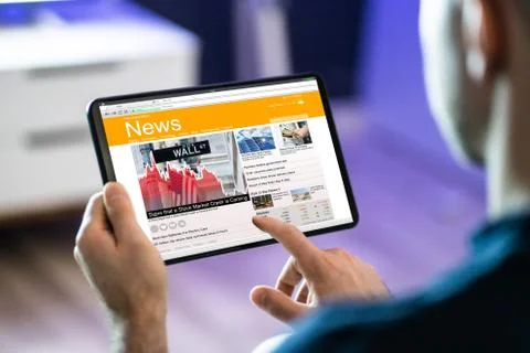 Man Using Tablet Computer Reading Electronic News Stock Photos
