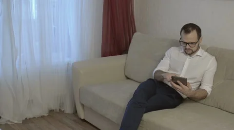 Man using tablet computer touchscreen Stock Footage 58100642