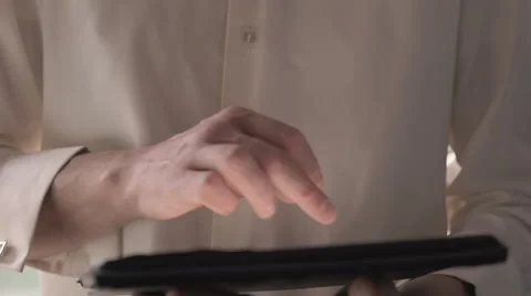 Man using tablet computer touchscreen Stock Footage 63114001