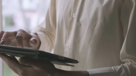 Man using tablet computer touchscreen Stock Footage 63114177