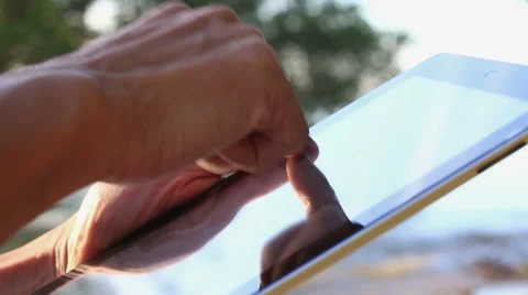 Man using tablet computer touchscreen in the morning. Stock Footage 65560371