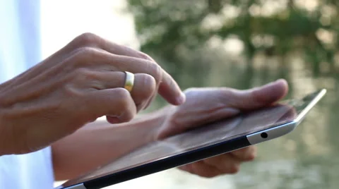 Man using tablet computer touchscreen in the morning. Stock Footage 65560395