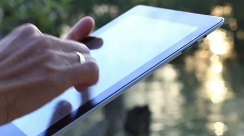 Man using tablet computer touchscreen in the morning. Stock Footage 65560426