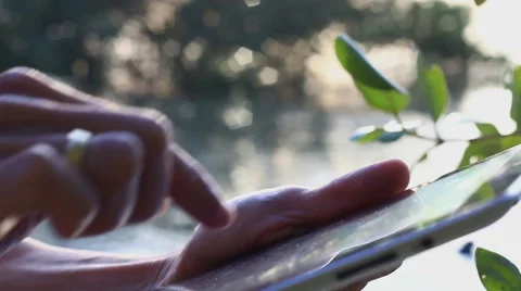 Man using tablet computer touchscreen in the morning. Stock Footage 65564369