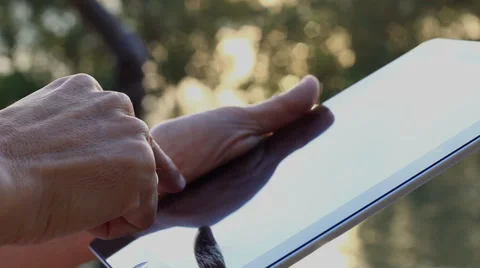 Man using tablet computer touchscreen in the morning. Stock Footage 65564518