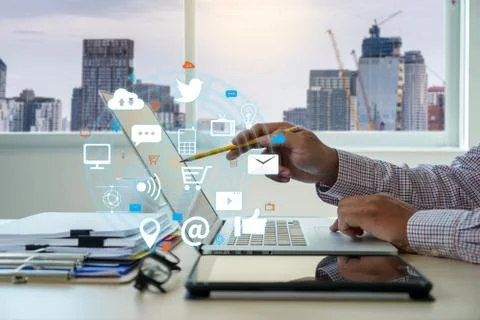 Man using  tablet computer  virtual interface graphic icons network diagram D Stock Photos