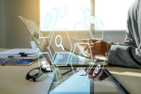 Man using  tablet computer  virtual interface graphic icons network diagram D Foto stock