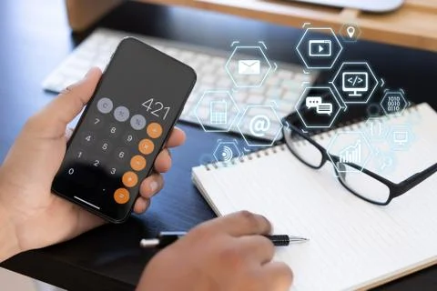 Man using  tablet computer  virtual interface graphic icons network diagram D Stock Photos