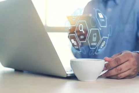 Man using  tablet computer  virtual interface graphic icons network diagram D Stock Photos