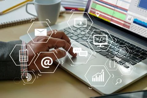 Man using  tablet computer  virtual interface graphic icons network diagram D Stock Photos