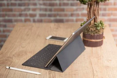 Man using a tablet computer to work Stock Photos
