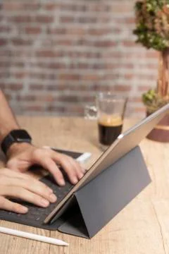 Man using a tablet computer to work Stock Photos