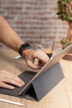 Man using a tablet computer to work Stock Photos